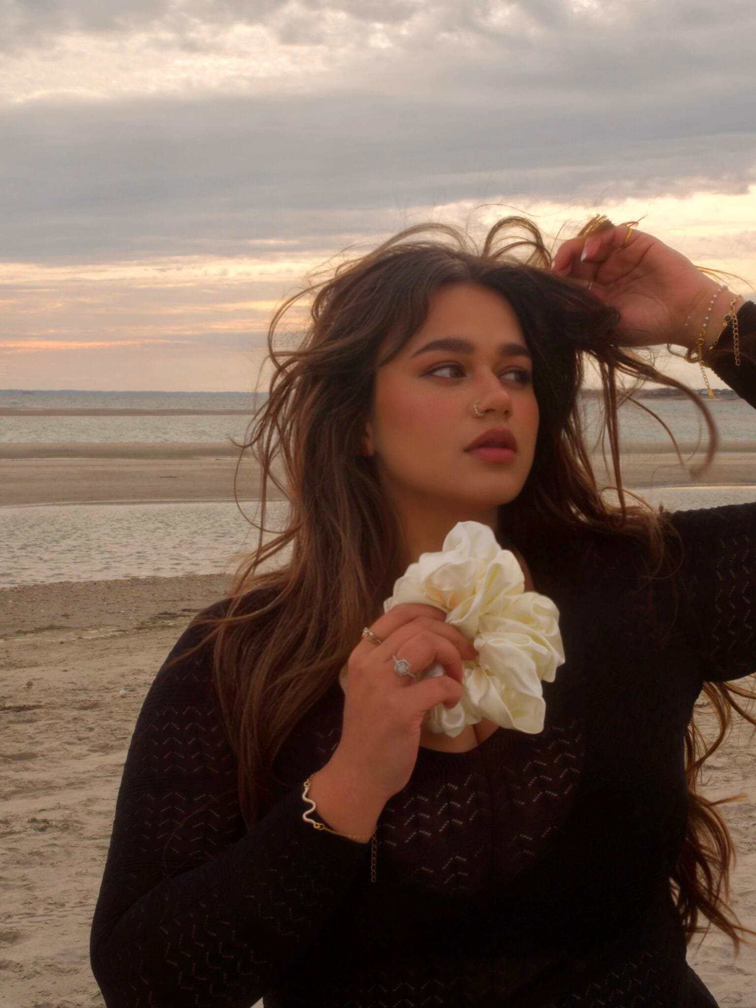 karishma vijay holding kishkin's cloud scrunchie